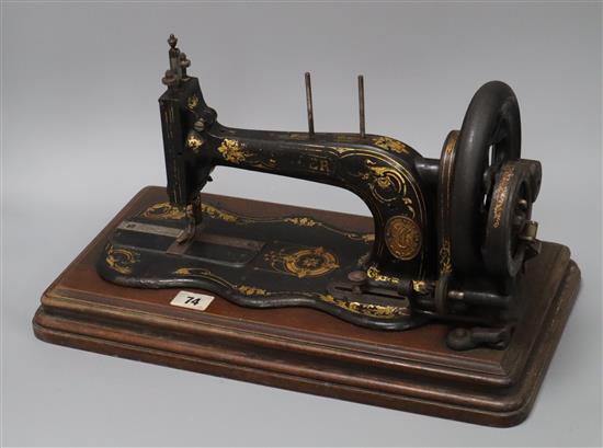 A German sewing machine, cased